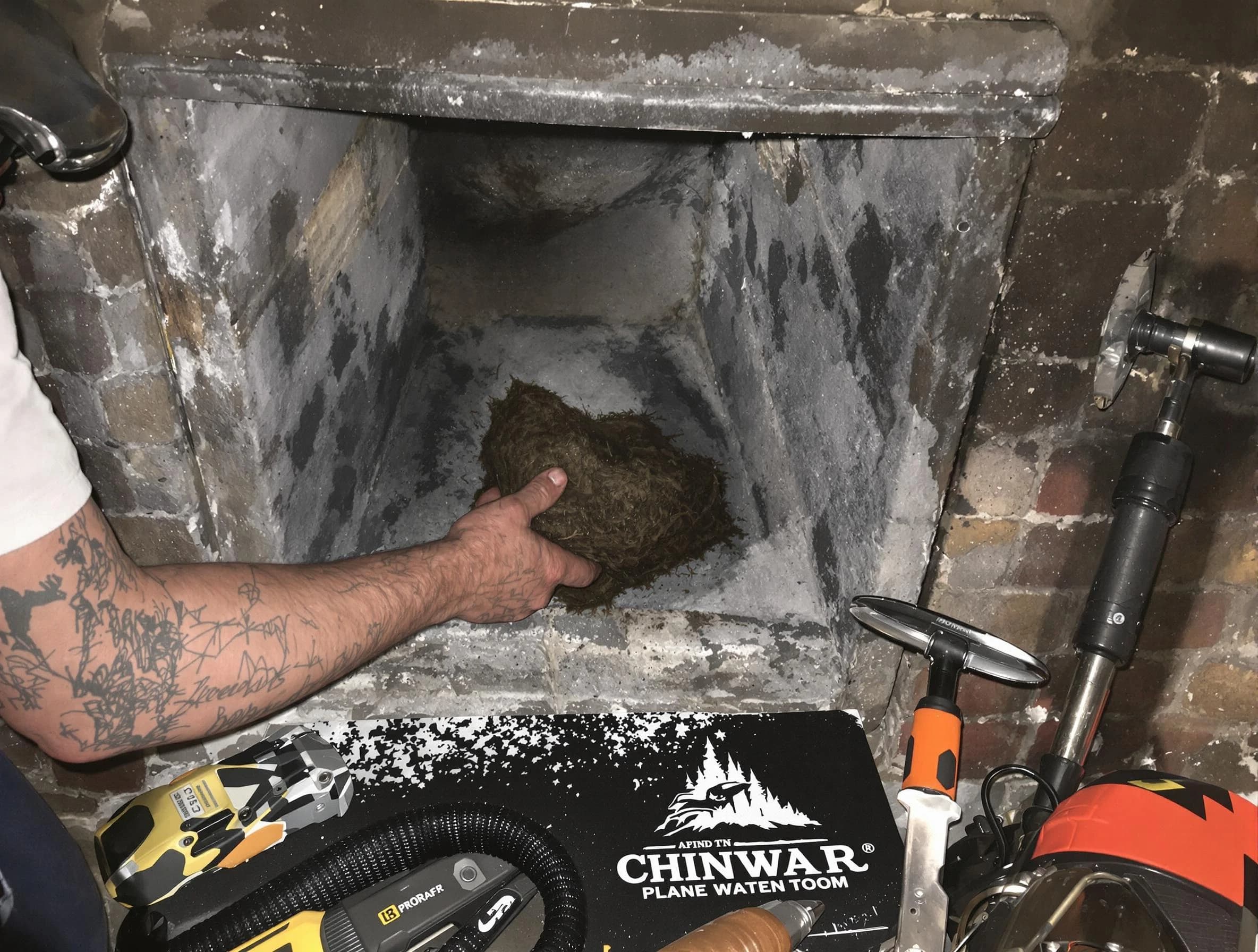 Park City Chimney Sweep safely removing debris and screening chimney in Park City, UT